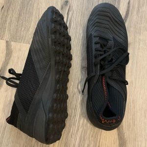 Black turf soccer cleats
